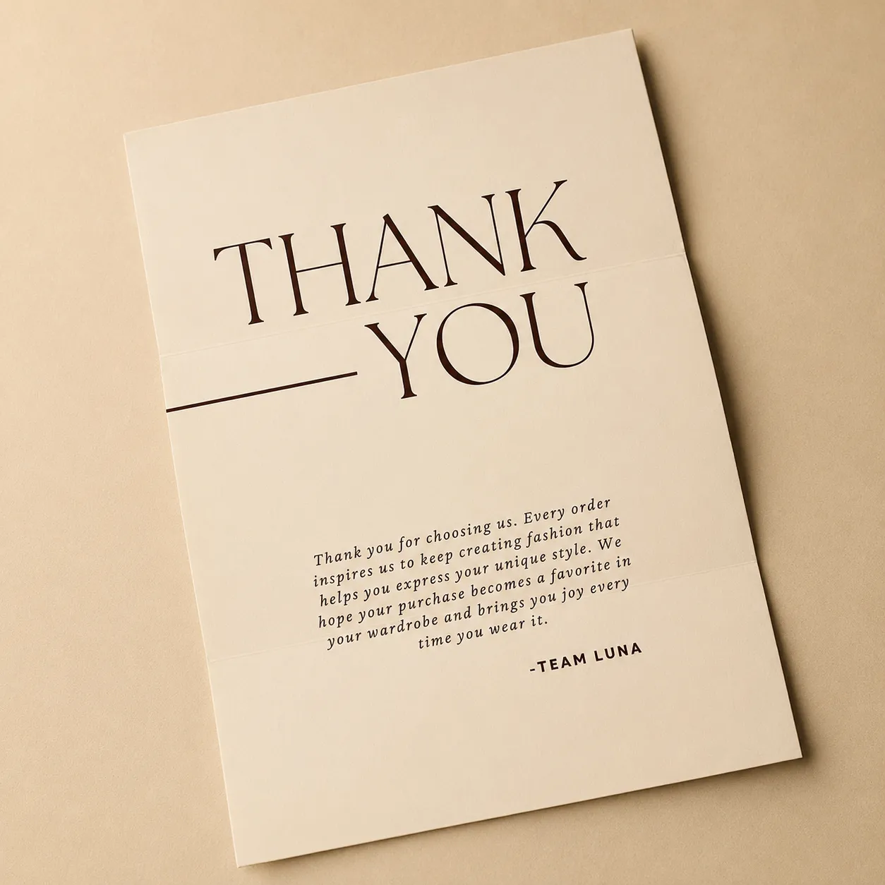 Branded thank-you card with matching envelope